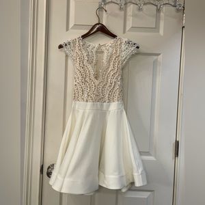 White women’s dress. Size small.